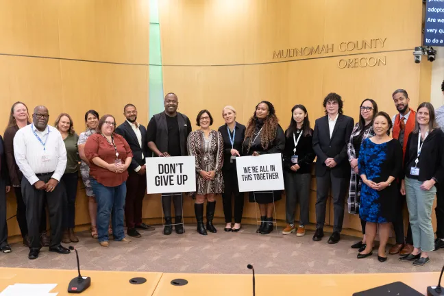 County Commissioners and members of the suicide prevention coalition recognize suicide prevention awareness month