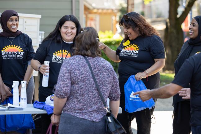 Bienestar de la Familia staff on Aug. 17, 2022 during a foo and cooling kit drive.