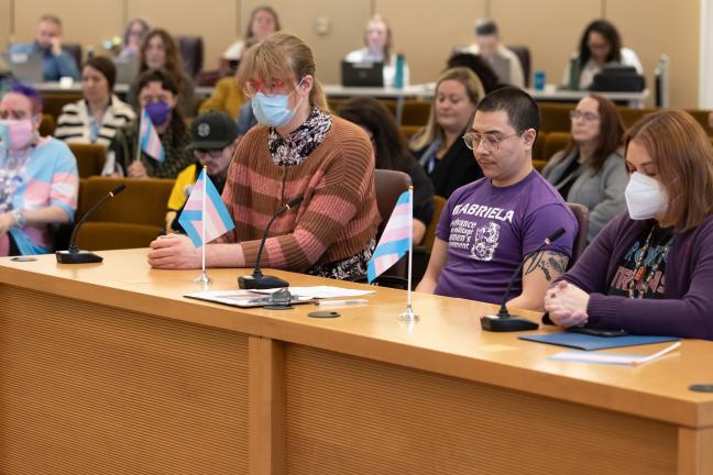 From left: Niki from Kalikasan Solidarity Organization; community member Crisanto Barajas from Gabriela PDX; and JB/Julia Brown, a mental health consultant with the Behavioral Health Division during moment of silence at the November 21, 2024 board meeting