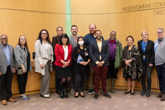 The Board, County employees, and community members gather to honor World AIDs Day.