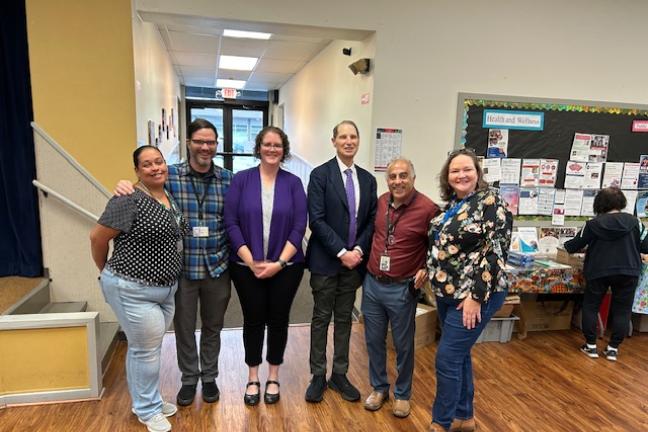 Fern Dalton, John Henry Crippen and Carisa Dickson of the Department of County Human Services, Senator Ron Wyden, DCHS Director Mohammed Bader, and Emily Berndt of DCHS at the Community for Positive Aging (formerly Hollywood Senior Center).