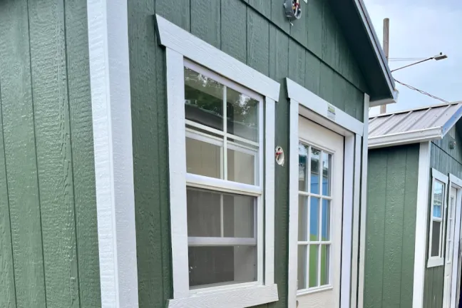 Two tiny home village shelters