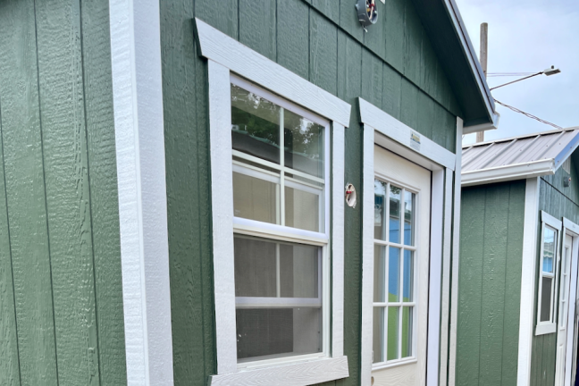 Two tiny home village shelters