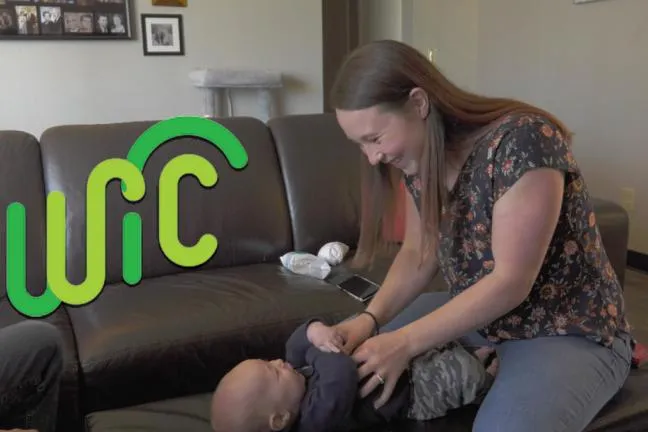 Mom playing with baby
