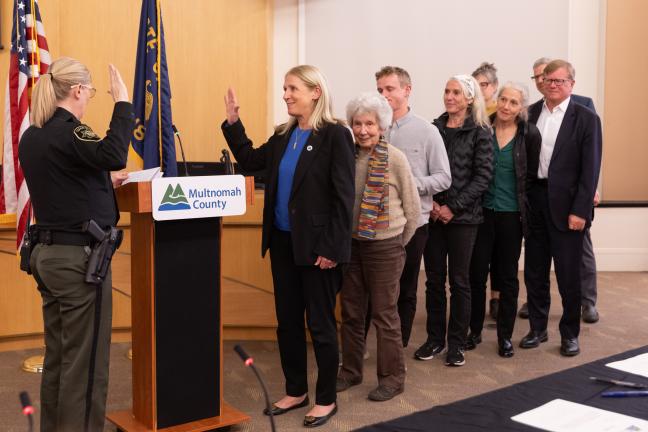 Commissioner Julia Brim-Edwards is sworn in by Sheriff Nicole Morrisey O'Donnell on Jan. 6, 2025, in the Multnomah County Boardroom.