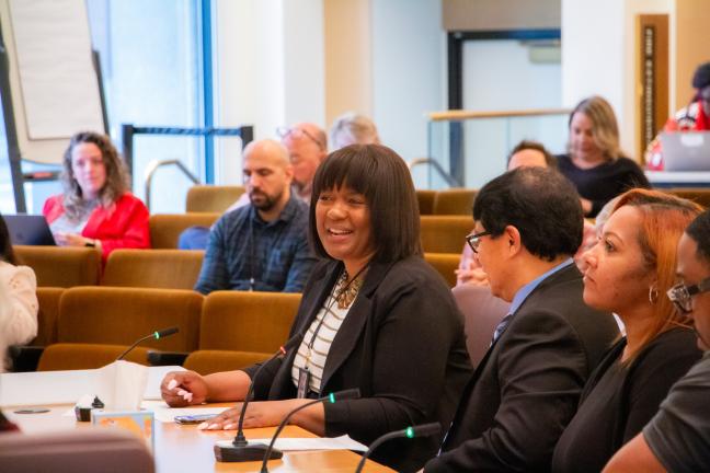 Leslee Barnes at the dais in the Multnomah County boardroom