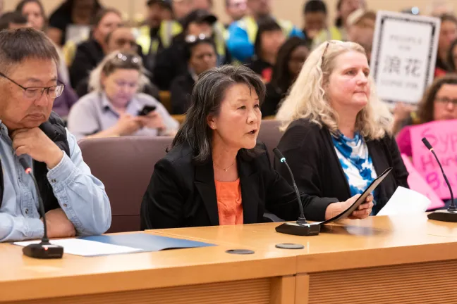 Community members speak before commission.