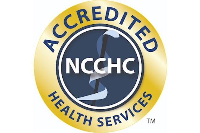 A digital award that says Accredited Health Services NCCHC