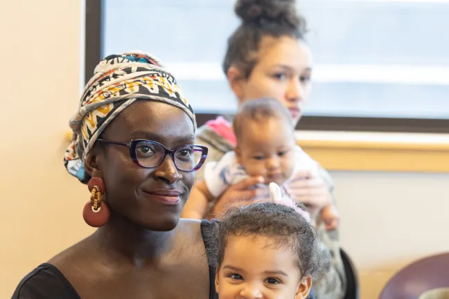 A mother and her child at a WIC cooking class