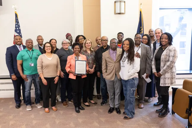 The Multnomah County Board and  staff pose for a photo in the Board Room in observation of Juneteenth