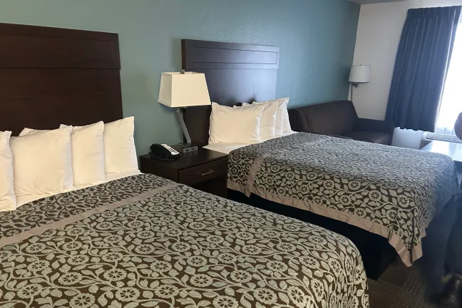 Two beds in a motel room