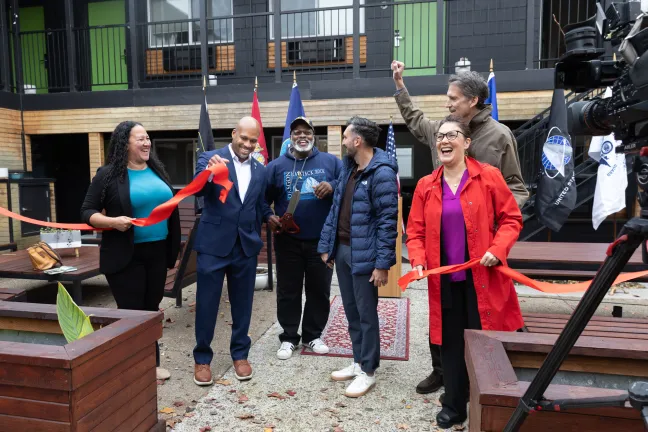Ribbon-cutting at a preview event for a soon-to-open recovery-focused motel shelter for veterans in North Portland, on Tuesday, Nov. 11, 2025.