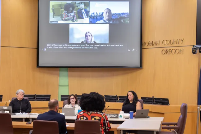 A wide shot of a Multnomah County Board meeting