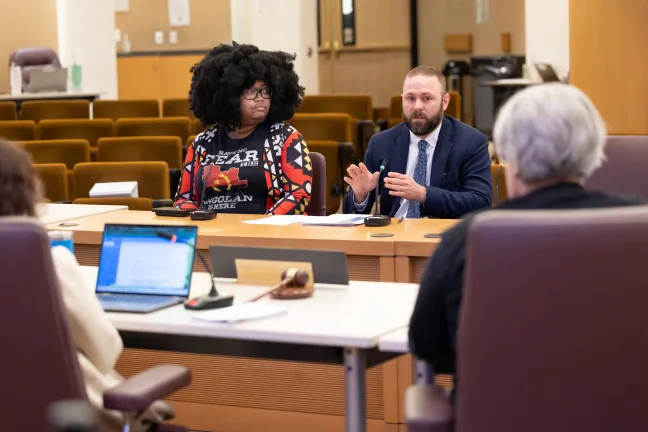 Tuesday’s briefing was led by Salomé Chimuku (left) a policy advisor for Commissioner Singleton and Garet Prior, a senior policy advisor for Chair Vega Pederson.