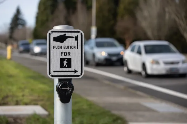 Push button control for pedestrian signal
