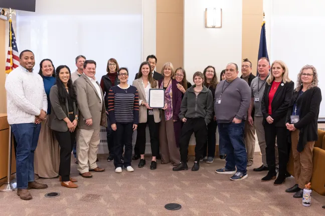 The Board of County Commissioners and invited guests celebrate Procurement Month