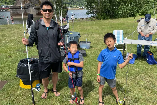 A family with children ready to fish in Cathedral Park