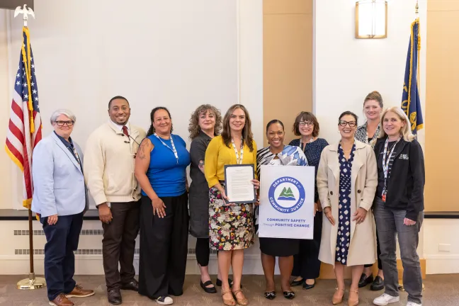  County leaders and community members pose for a photo during the Probation, Parole and Post-Prison Supervision Week designation. 