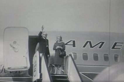 Black and white photograph of Barry Goldwater disembarking from a plane