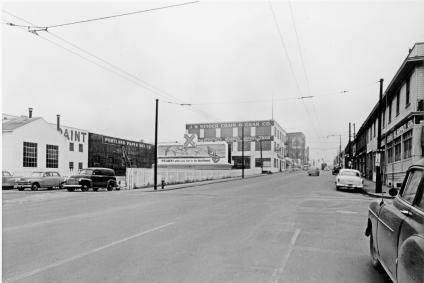 Historic image of Hawthorne Avenue looking west. Portland Paper Box Co. and J.W. Minder Chain and Gear Co. are visible.