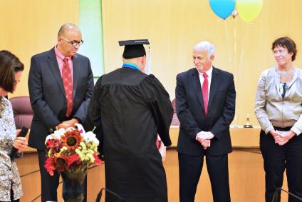 From left to right: Cheyenne Tuller; Londer teacher, Truls Neal; Assistant Division Director for Adult Services, Shawn Sanders; Londer 2015 graduate, Scott Taylor; DCJ Director, Erika Preuitt; DCJ District Manager