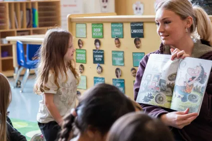 Preschool for All - teacher reading to students