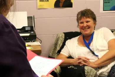 Sonja Miller (right) chats with Claudia Havener, a county mental health consultant, during their July 3 clinical supervision meeting.