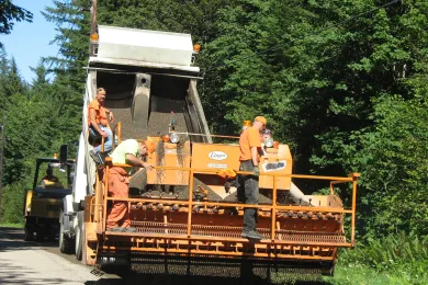 Chip seal spreader and truck