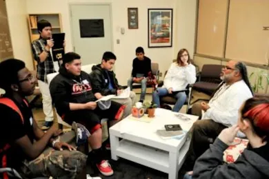 photo of John Ashford being honored in classroom
