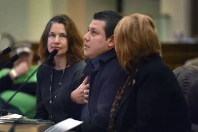 County placement specialist Carolyn McGrath and adult care home operator Juan Galdamez