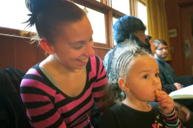 Tiffany Wright and her daughter at the old Family Winter shelter location in 2012. At the time, Wright spoke to reporters about having moved out of the shelter and into permanent housing.  