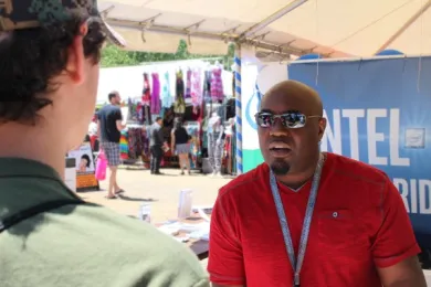 Eric Ensley conducting veterans outreach during PRIDE 2015.