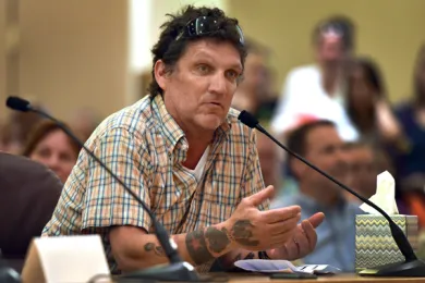 Gary Cobb of Central City Concern's  Recovery Mentor Program address the board at Wednesday's budget hearing.