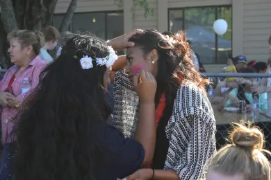 Girls face painting at event