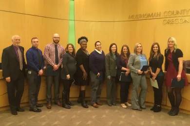 Newly sworn Probation and Parole Officers pose with Scott Taylor and Erika Preuitt
