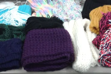 Hats and scarves knitted by A&E participants 