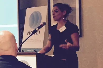 Denise Pena accepting the Voice for Justice Award