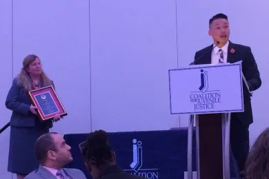 Sang Dao delivers his acceptance speech at the CJJ award ceremony. 