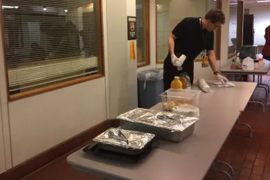Dave Riley setting up food and drinks for Breakfast Club.