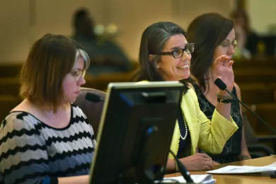 Department of County Human Services Director Liesl Wendt (center) addresses the board on Tuesday.
