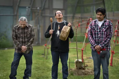 Sundance Chief John Bravehawk, Latino Network care manager and singer Rodolfo Serna and firekeeper Gerardo Calixto-Cara take part in blessing ceremony for new sweat lodge.