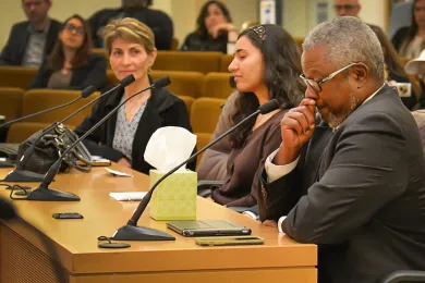 Jimmy Brown (right) tearfully recalls falling in love with wife of forty years, Kathy during Thursday's board meeting.  