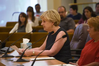 Charter Review Committee Chair Kirsten Leonard addresses the Board of Multnomah County Commissioners on Thursday.