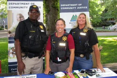 Parole and probation officers at the south park blocks booth 