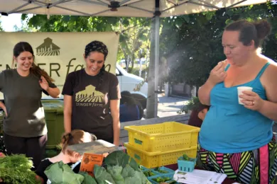 Angela Reed, right, says access  to fresh organic vegetables has transformed her health.