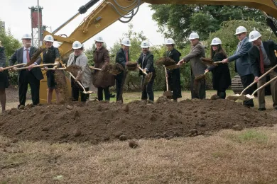 County Commissioners, state lawmakers, judges and members of the courthouse project team break ground on new central courthouse