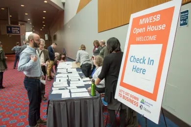 Photo courtesy: Jeremy Jeziorski, Marketing Coordinator with Oregon Convention Center shows guests at February Metro-Multnomah County MWESB Open House
