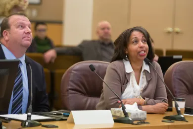 Greg Hockert and Vanetta  Abdellatif address the board.