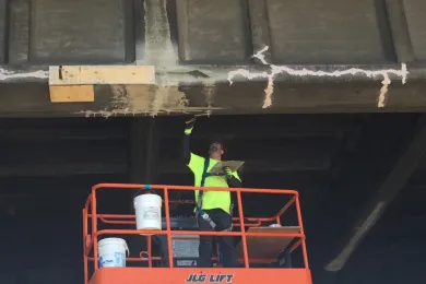 Patching cracks on Burnside Bridge girder, April 15, 2017