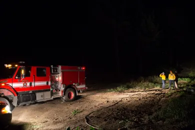 Firefighters work late into the night on the Eagle Creek Fire